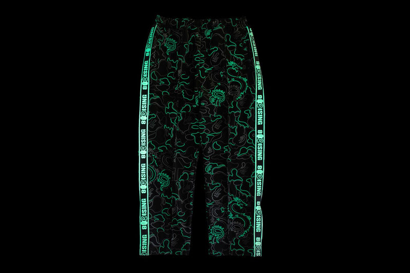BAPE X 88RISING GLOW IN THE DARK CAMO TRACK PANTS