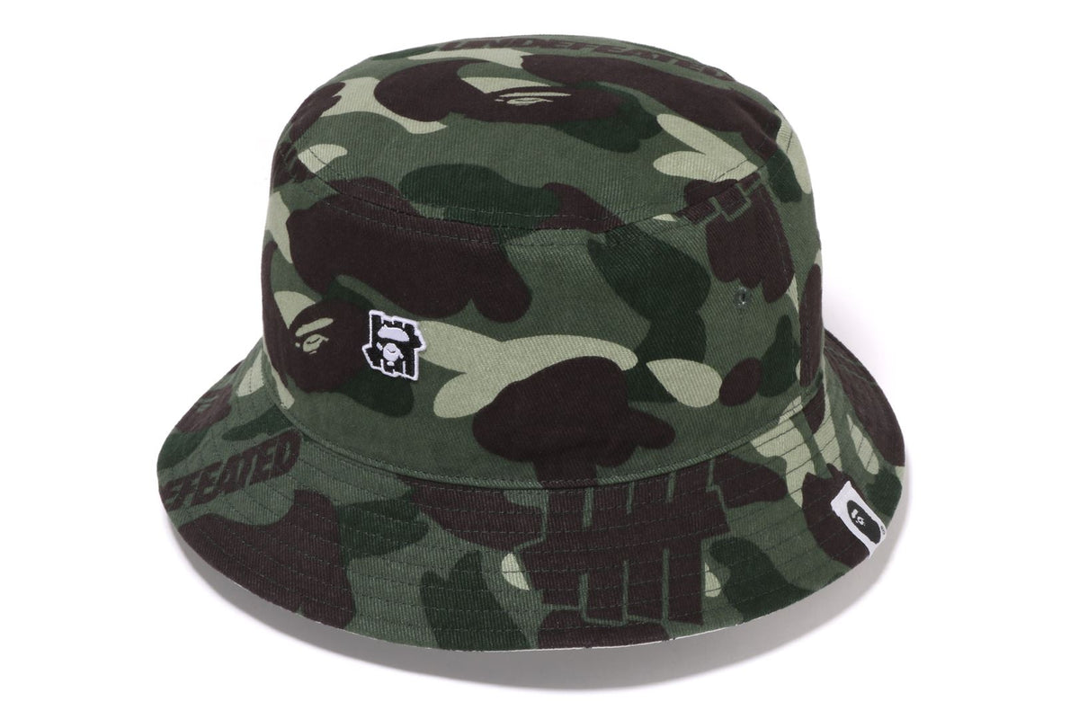 BAPEÂ® X UNDEFEATED COLOR CAMO FLANNEL BUCKET HAT