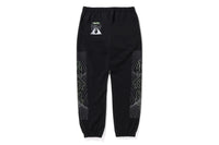 MULTI GRAPHIC TRACK PANTS