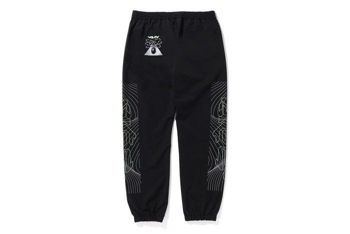 MULTI GRAPHIC TRACK PANTS