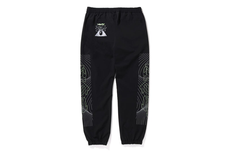 MULTI GRAPHIC TRACK PANTS