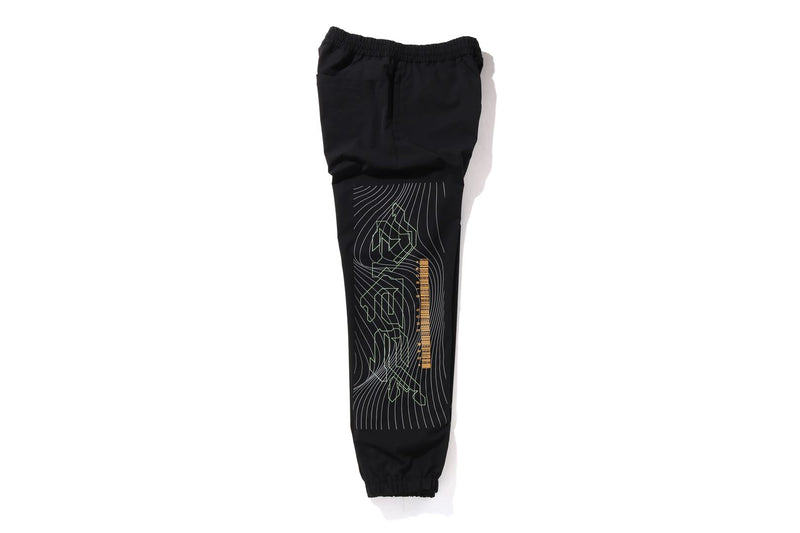 MULTI GRAPHIC TRACK PANTS